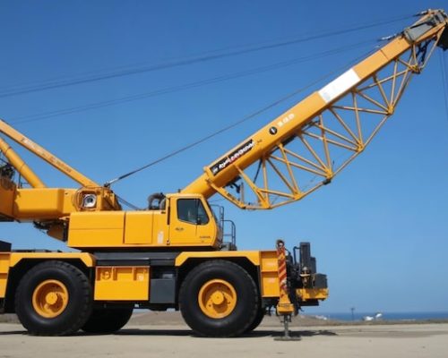 yellow-mobile-crane-sunny-day_1410957-54941